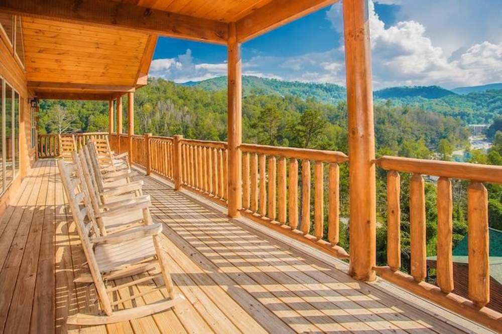 Cabin Rental Deck with patio chairs overlooking the mountains